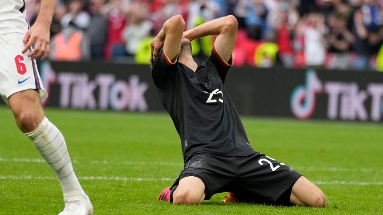 Thomas Muller reacts after missing a golden opportunity to draw Germany level