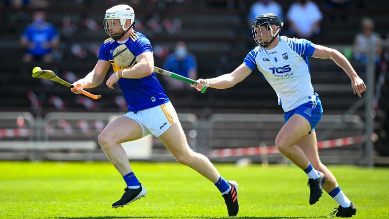 Michael Breen of Tipperary in action against Iarlaith Daly of Waterford