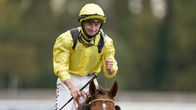 Tom Marquand celebrates victory on Addeybb in the Champion Stakes at Ascot in October