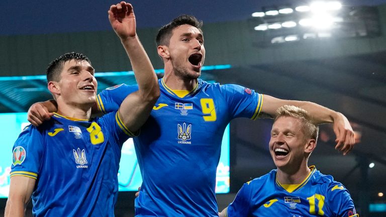 Ukraine's players celebrate their victory over Sweden in Euro 2020 last 16 (AP)