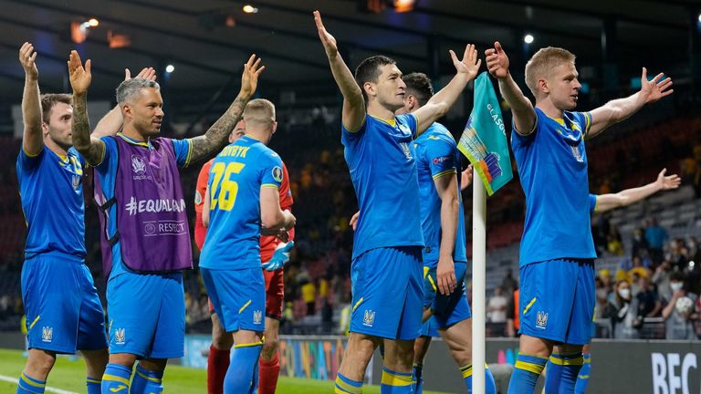 Ukraine players celebrate their extra-time win over Sweden