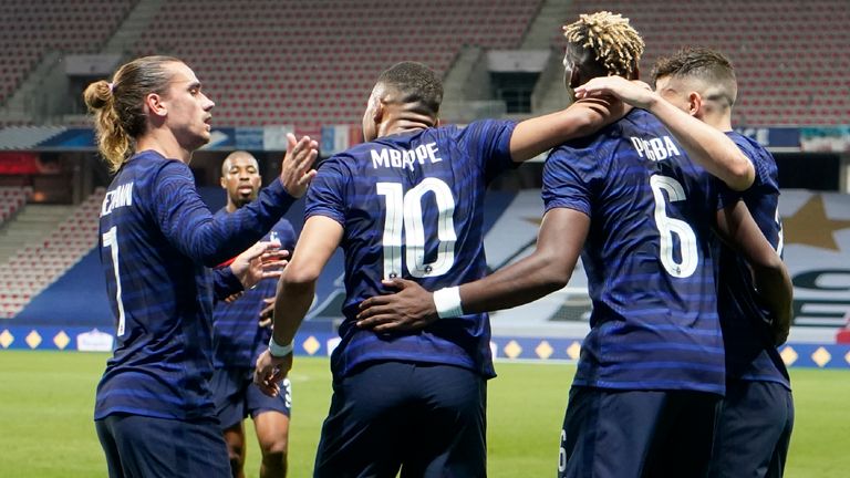 France's Kylian Mbappé, center, celebrates after scoring his side's opening goal during the international friendly soccer match between France and Wales at the Allianz Riviera stadium in Nice, France, Wednesday, June 2, 2021. (AP Photo/Daniel Cole)