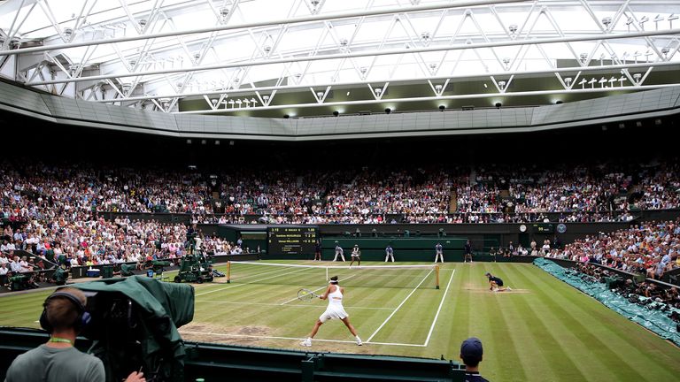General view of centre court and Venus Williams against Garbine Muguruza in the Ladie's Singles final on day twelve of the Wimbledon Championships at The All England Lawn Tennis and Croquet Club, Wimbledon. 