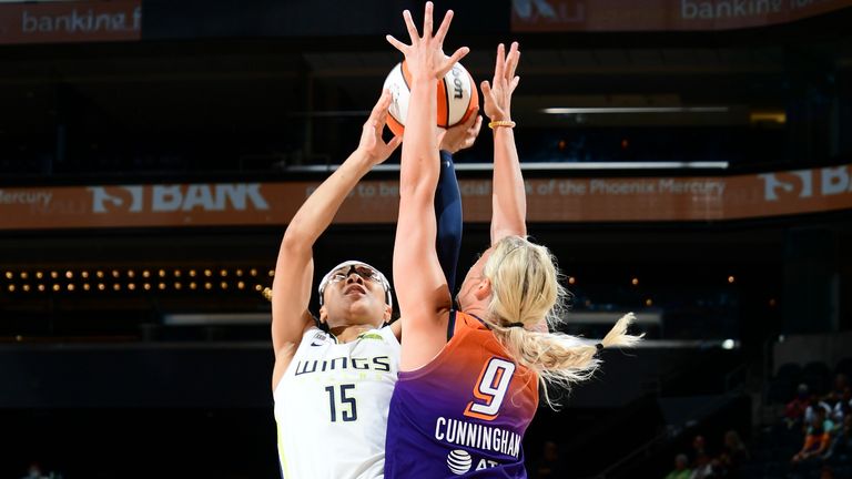 JUNE 11: Allisha Gray #15 of the Dallas Wings shoots the ball during the game against the Phoenix Mercury on June 11, 2021 at Phoenix Suns Arena in Phoenix, Arizona. 