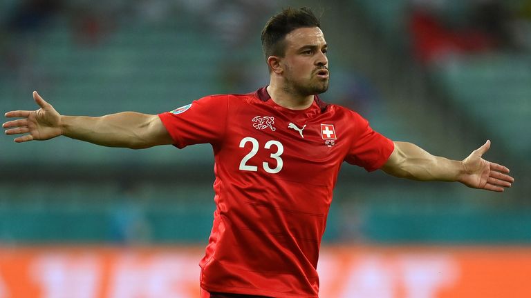 Switzerland&#39;s Xherdan Shaqiri celebrates after scoring against Turkey