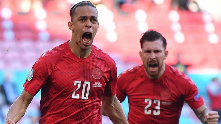 Yussuf Poulsen celebrates after giving Denmark an early lead against Belgium