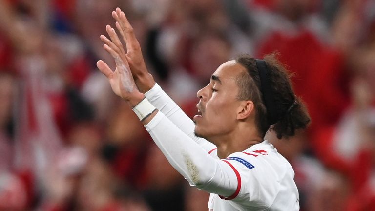 Denmark's Yussuf Poulsen celebrates after scoring his side's second goal during the Euro 2020 soccer championship group B match between Russia and Denmark
