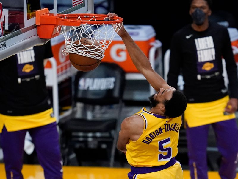 Depleted Lakers lose again, Paul and Booker star for red-hot Suns