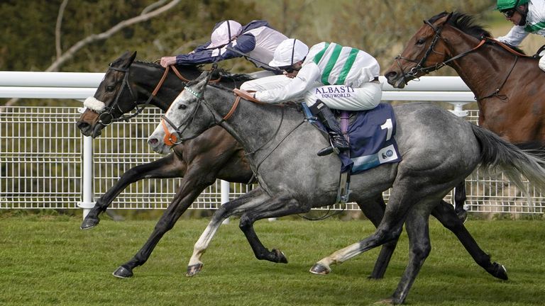 Luke Morris riding Alpinista (grey, nearest) coming home to win The British Stallion Studs EBF Daisy Warwick Fillies&#39; Stakes from Makawee and James Doyle (pink) at Goodwood Racecourse in Chichester. Picture date: Friday April 30, 2021.
