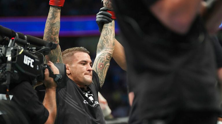 Dustin Poirier celebrates his win over Conor McGregor in their lightweight bout during UFC 264 at T-Mobile Arena on July 10, 2021, in Las Vegas, Nevada, United States. (Photo by Louis Grasse/PxImages/Icon Sportswire) (Icon Sportswire via AP Images)