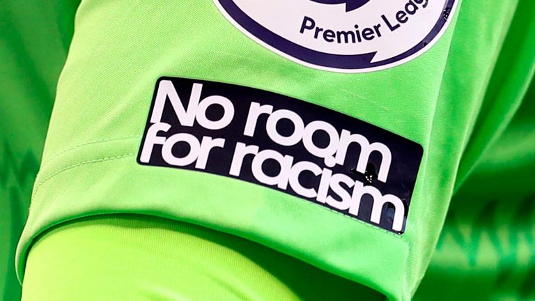 No Room For Racism logo on the shirt of Everton's goalkeeper Jordan Pickford during the English Premier League soccer match between Tottenham Hotspur and Everton at the Tottenham Hotspur Stadium in London, Sunday, Sept. 13, 2020. (Cath Ivill/Pool via AP)