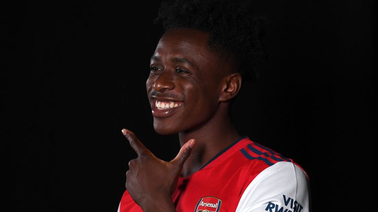New signing Albert Sambi Lokonga poses in an Arsenal shirt