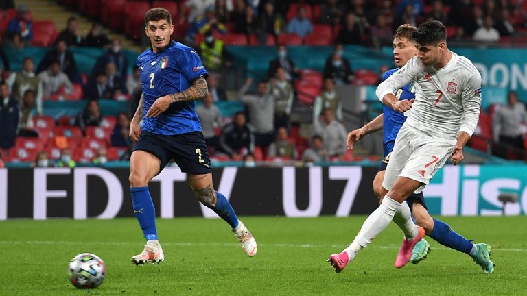 Spain's Alvaro Morata scores against Italy