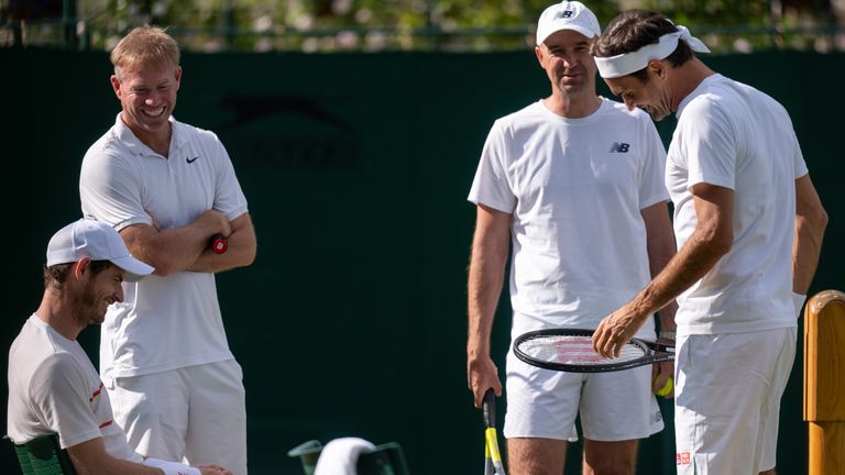 Andy Murray (GBR) and Roger Federer (SUI) chatting during their practice match on Court 14 at The All England Lawn Tennis and Croquet Club. Picture date: Friday June 25, 2021.