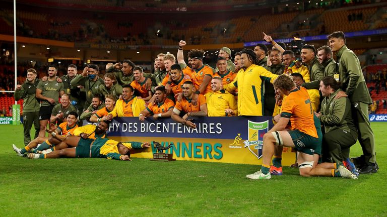 Wallabies players celebrate victory 