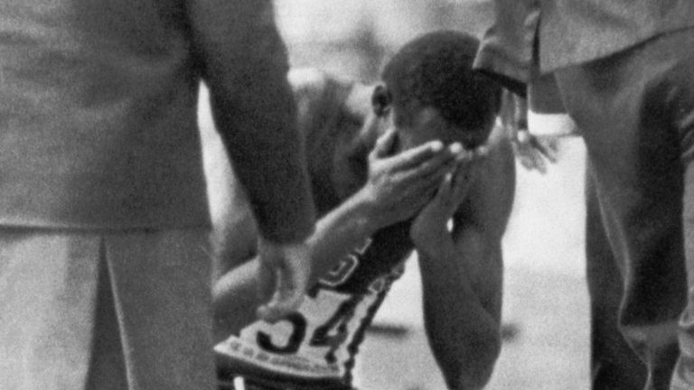 Bob Beamon ran about waving his hands and finally fell to his knees in emotion when he was told he had jumped over 29 feet. 