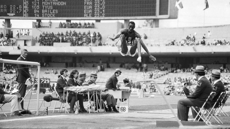 American long jumper Bob Beamon breaks the world record at the 1968 Olympics