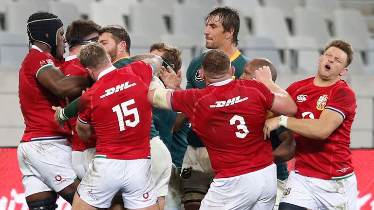 Lions and Springboks players scuffle during the first half of the second Test