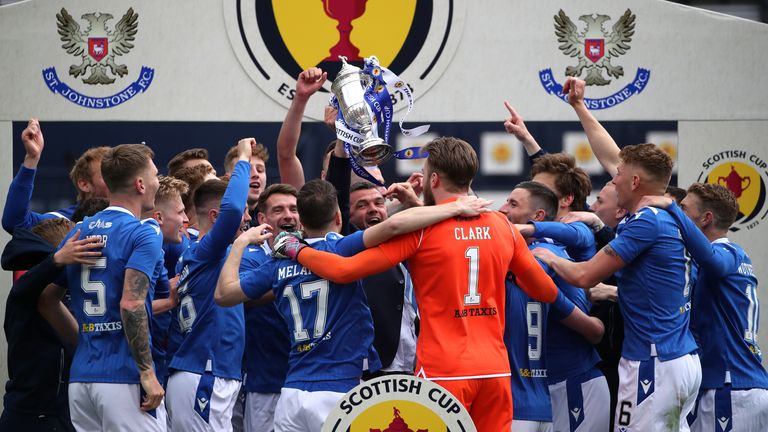 St Johnstone manager Callum Davidson lifts the trophy after the final whistle during the Scottish Cup final match at Hampden Park
