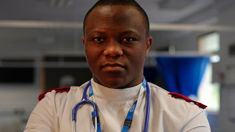 Cyrille Tchatchet, refugee athlete from Cameroon smiles in the simulation ward of Middlesex University May 15, 2019. Tchatchet, a 23-year-old weightlifter, is first British-based athlete accepted onto the refugee support programme and will be eligible to represent the IOC's refugee team at the 2020 Olympic Games in Tokyo. He was granted refugee status in February 2016 and then accepted to study mental health nursing at Middlesex later that year. 