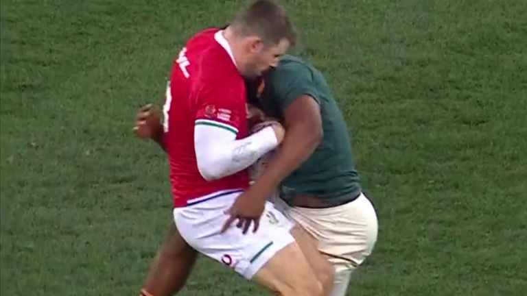 Elliot Daly gets hit hard by Lukhanyo Am in the opening Test between South Africa and the British and Irish Lions. 