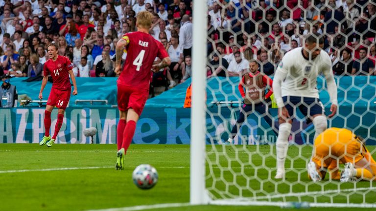 Pickford lies beaten on the turf as Damsgaard and his team-mates celebrate