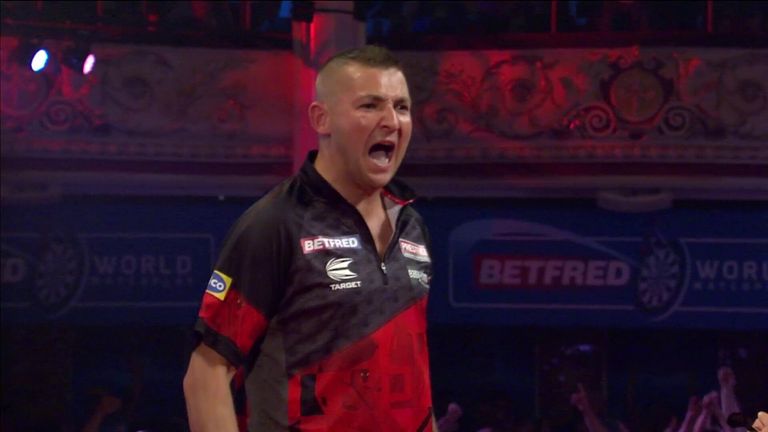 Nathan Aspinall hits a 130 checkout in the World Matchplay quarter-final against Michael van Gerwen.