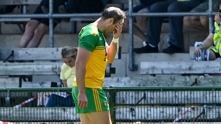 Michael Murphy of Donegal leaves the field after being sent off