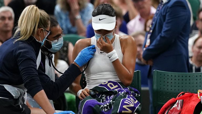 Emma Raducanu appears to be struggling during a break in the match against Ajla Tomljanovic in their Women's Singles Round of 16 match on day seven of Wimbledon at The All England Lawn Tennis and Croquet Club, Wimbledon. Picture date: Monday July 5, 2021.