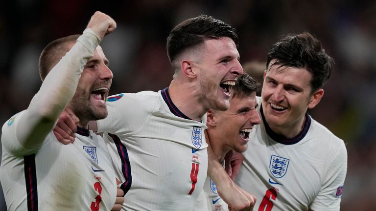 AP - England players celebrate against Denmark