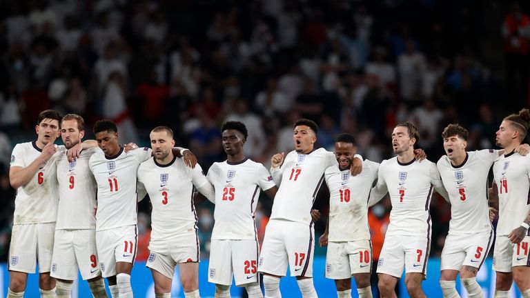 England players react during a penalty shootout at the end of the Euro 2020 soccer championship final match between England and Italy at Wembley stadium in London, Sunday, July 11, 2021. Italy defeated England 3-2 in a penalty shootout after the game ended in a 1-1 draw. (Carl Recine/Pool Photo via AP)