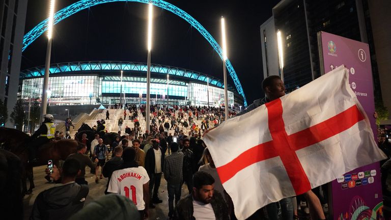 PA - England fans celebrate outside Wembley