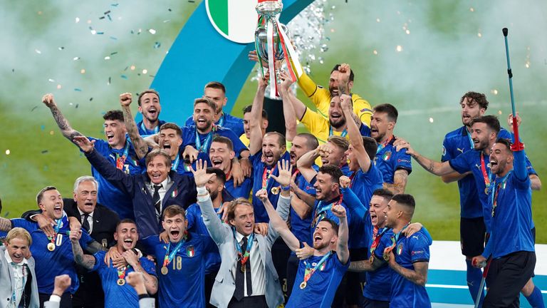 Italy captain Giorgio Chiellini lifts the UEFA Euro 2020 trophy following his side&#39;s victory over England 