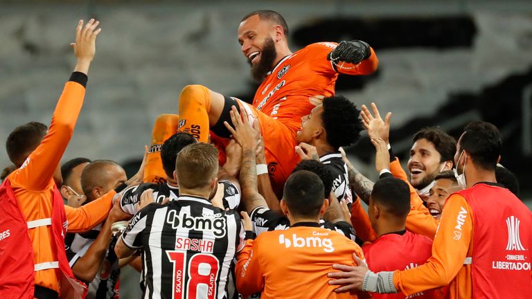 Atletico Mineiro players celebrate after beating Boca Juniors on penalties in the Copa Libertadores