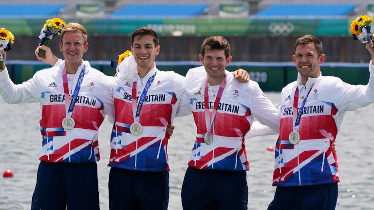 Harry Leask, Angus Groom, Tom Barras and Jack Beaumont celebrate winning their silver medal for Great Britain