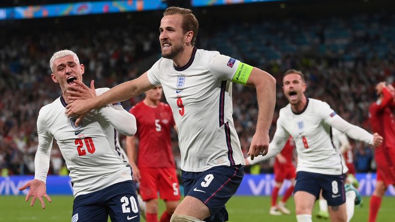 England's Harry Kane celebrates after scoring his side's second goal during the Euro 2020 soccer semifinal match between England and Denmark at Wembley 