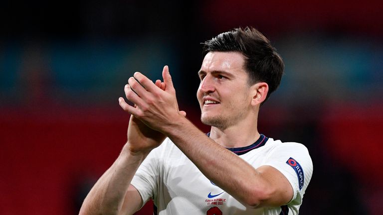 AP - Harry Maguire claps the England fans