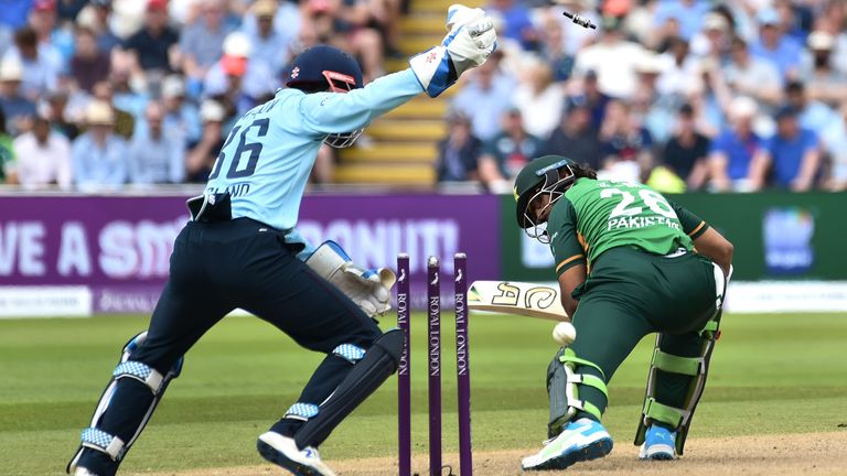 Pakistan...s Imam-ul-Haq, right, bowled by England...s Matt Parkinson during the third one day international cricket match between England and Pakistan at Edgbaston cricket ground in Birmingham, England, Tuesday, July 13, 2021. (AP Photo/Rui Vieira)..