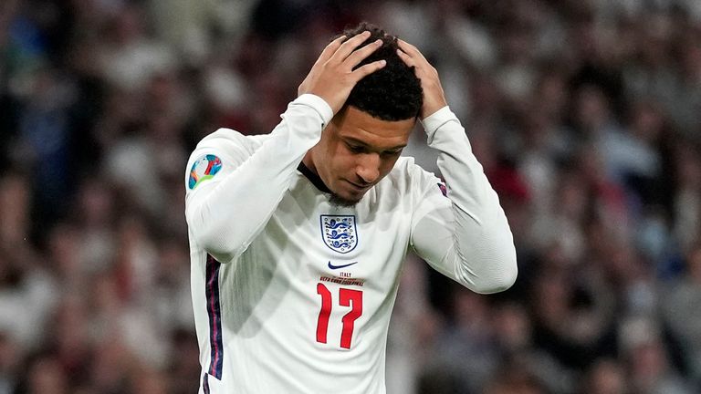 England&#39;s Jadon Sancho reacts after he missed to score during the penalty shootout of the Euro 2020 soccer championship final between England and Italy at Wembley 
