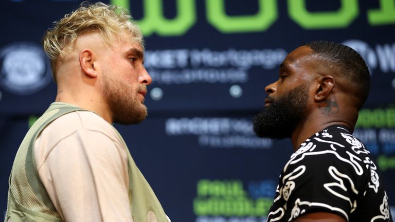 Jake Paul (L) and Tyron Woodley (R) face off during a press conference before their cruiserweight fight at The Novo by Microsoft at L.A. Live on July 13, 2021 in Los Angeles, California. (Photo by Katelyn Mulcahy/Getty Images)