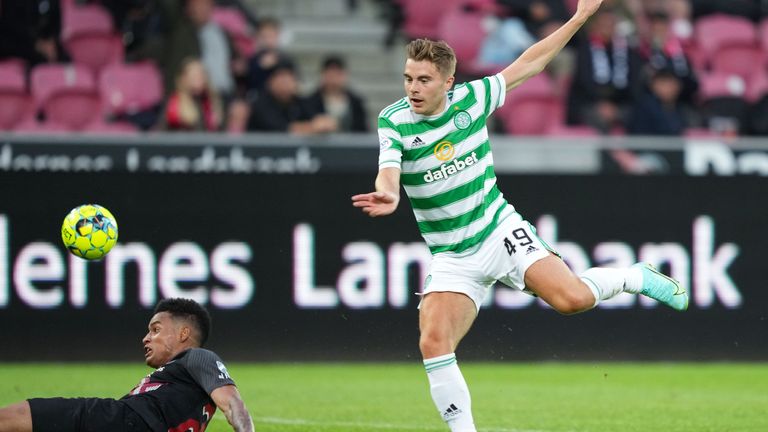 Celtic's James Forrest has a shot blocked by Paulinho