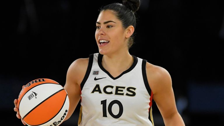 Kelsey Plum of the Las Vegas Aces brings the ball up the floor while playing the Los Angeles Sparks