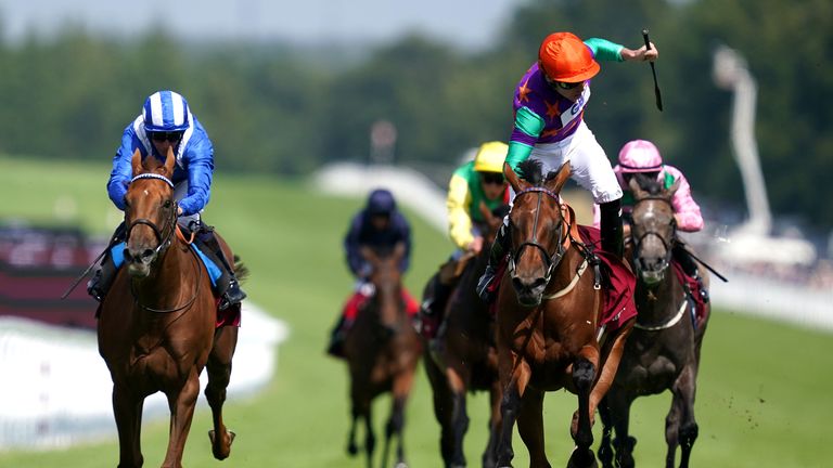 Kieran Shoemark stands up in the saddle as Lady Bowthorpe wins the Nassau Stakes