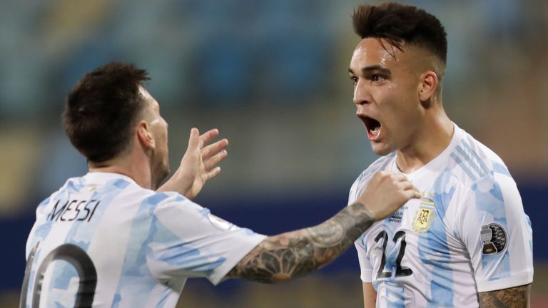 Lautaro Martinez and Lionel Messi celebrate after scoring