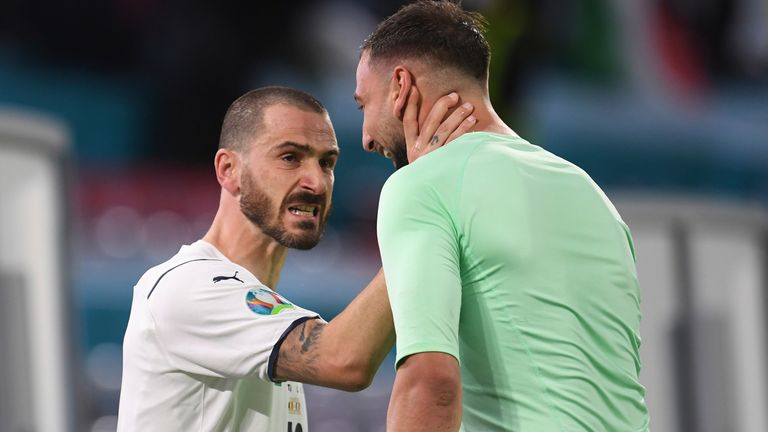 Leonardo Bonucci celebrates with Gianluigi Donnarumma