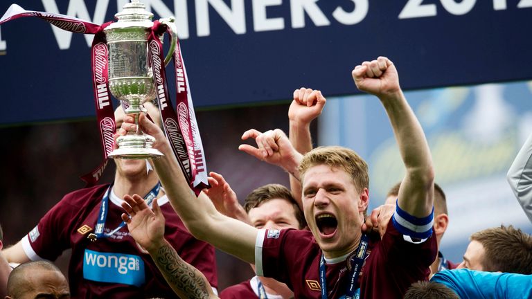 Marius Zaliukas celebrates with the Scottish Cup 