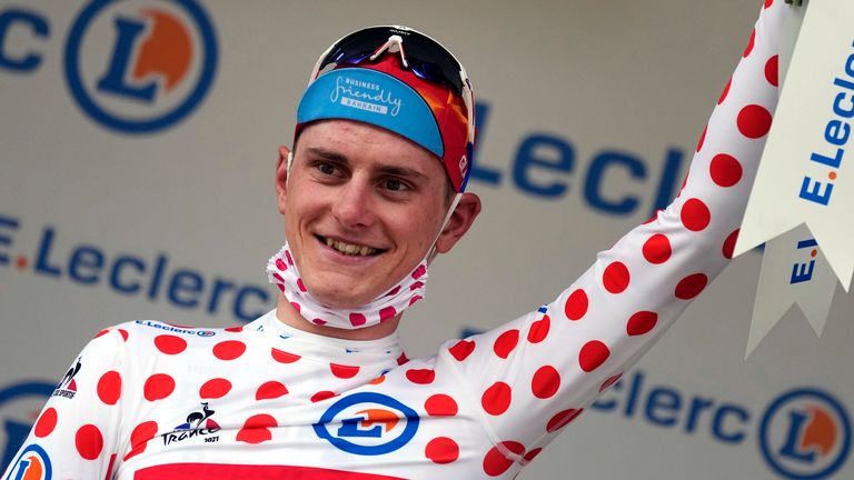 Slovenia's Matej Mohoric wears the best climber's dotted jersey on the podium of the seventh stage of the Tour de France. (AP Photo/Daniel Cole)
