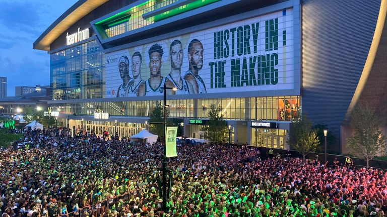 Milwaukee Bucks fans gather outside Fiserv Forum during the 2021 NBA Finals