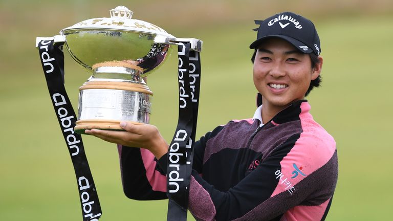 Min Woo Lee with the trophy after winning the abrdn Scottish Open