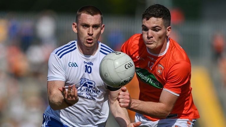 Micheál Bannigan of Monaghan in action against Jarly Óg Burns of Armagh